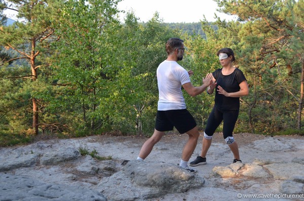 Kyra and Andre training blindfold single hand pushing hands